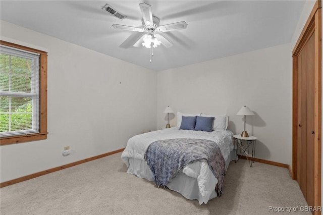 11192 Eventide Ln, Gloucester, VA 23061 - bedroom featuring light carpet, a closet, and a ceiling fan