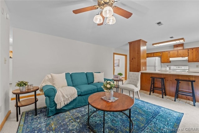 11192 Eventide Ln, Gloucester, VA 23061 - living area with a ceiling fan and light colored carpet
