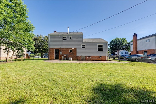 619 Winnetka Ave, Richmond, VA 23227 - rear view of property featuring a patio and brick siding