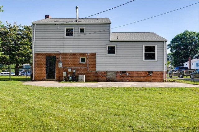 619 Winnetka Ave, Richmond, VA 23227 - rear view of house with a chimney and a patio area