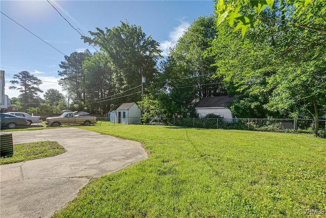 619 Winnetka Ave, Richmond, VA 23227 - view of yard featuring concrete driveway