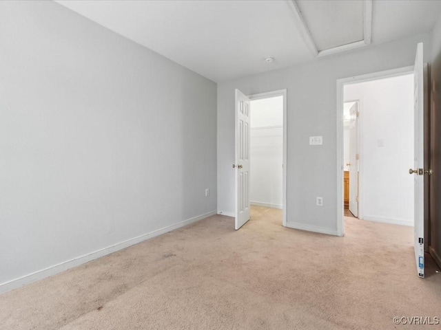 1624 Harvest Grove Ln, Henrico, VA 23223 - unfurnished bedroom with light colored carpet, a spacious closet, attic access, and a closet