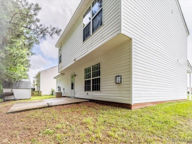1624 Harvest Grove Ln, Henrico, VA 23223 - back of property featuring a patio area, a yard, and a storage unit
