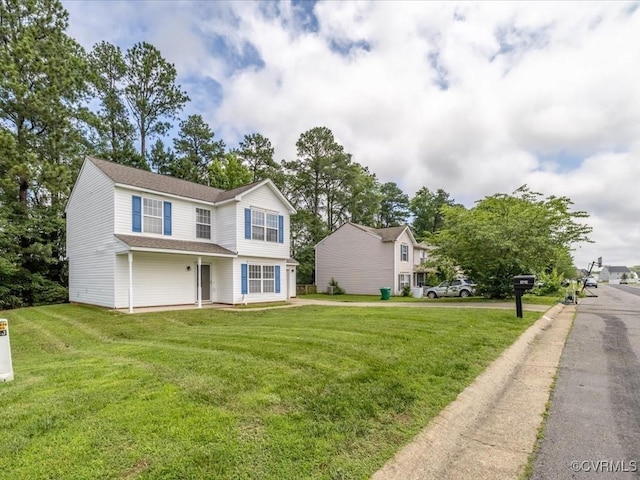 1624 Harvest Grove Ln, Henrico, VA 23223 - view of front of home with a front yard and a shingled roof