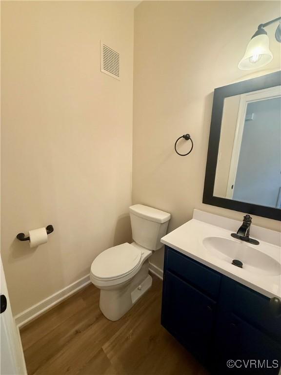 10342 Brickerton Dr, Mechanicsville, VA 23116 - bathroom featuring wood finished floors and vanity