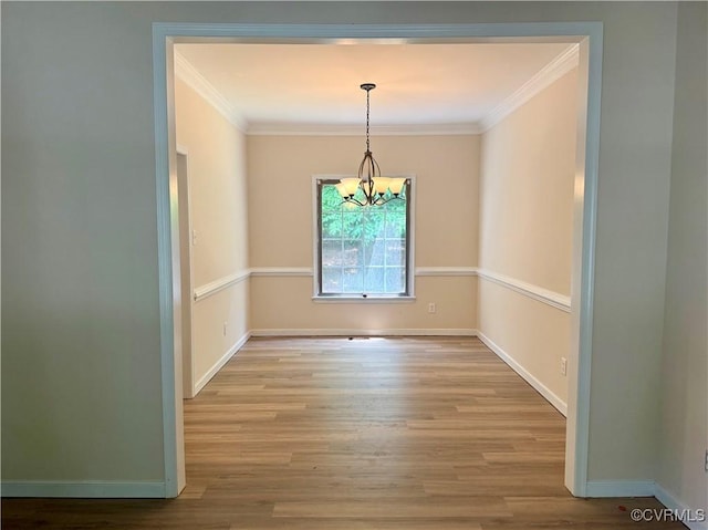 10342 Brickerton Dr, Mechanicsville, VA 23116 - unfurnished dining area featuring a chandelier, crown molding, and wood finished floors