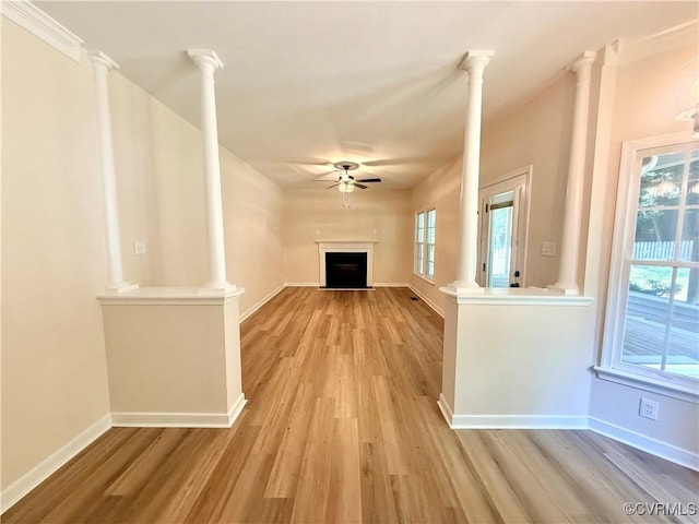 10342 Brickerton Dr, Mechanicsville, VA 23116 - unfurnished living room with ceiling fan, light wood finished floors, and a fireplace