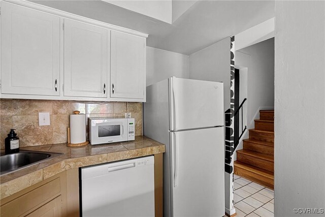10 Skipwith Green Cir, Henrico, VA 23294 - kitchen featuring white appliances, tile countertops, tasteful backsplash, and white cabinetry
