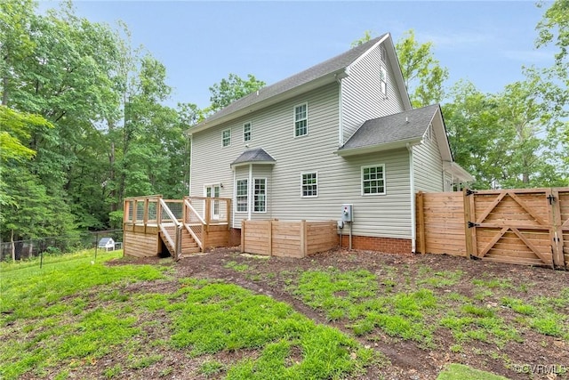 16494 Connie Hall Rd, Montpelier, VA 23192 - back of house with a gate, a deck, and roof with shingles
