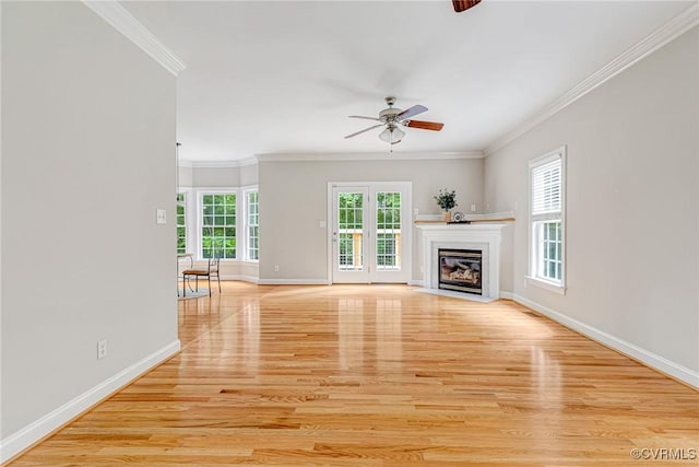 16494 Connie Hall Rd, Montpelier, VA 23192 - unfurnished living room with ornamental molding, light wood-type flooring, a ceiling fan, and a fireplace with flush hearth