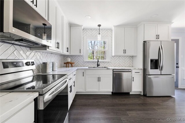 341 Rossmere Dr, Midlothian, VA 23114 - kitchen with stainless steel appliances, backsplash, white cabinetry, light stone countertops, and recessed lighting