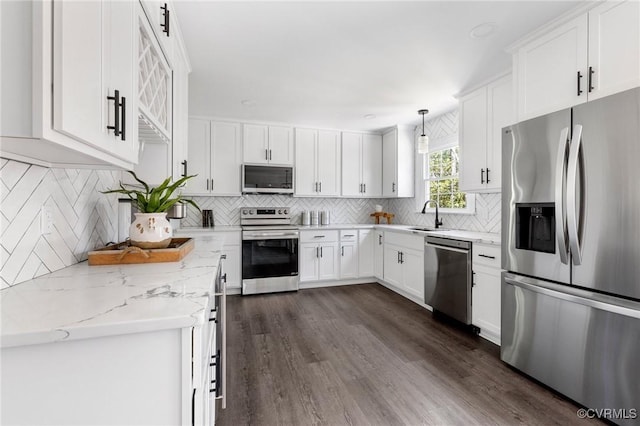 341 Rossmere Dr, Midlothian, VA 23114 - kitchen with stainless steel appliances, white cabinets, backsplash, and dark wood-type flooring