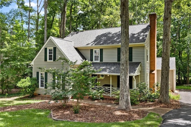 341 Rossmere Dr, Midlothian, VA 23114 - view of front facade with roof with shingles, a chimney, and a porch