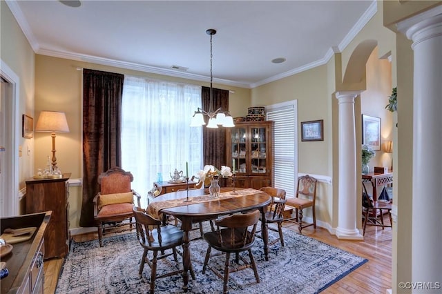 5669 Virginia Park Dr, Providence Forge, VA 23140 - dining area featuring decorative columns, a chandelier, light wood finished floors, and crown molding