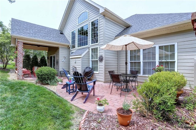5669 Virginia Park Dr, Providence Forge, VA 23140 - back of house with a patio area, a shingled roof, and a lawn