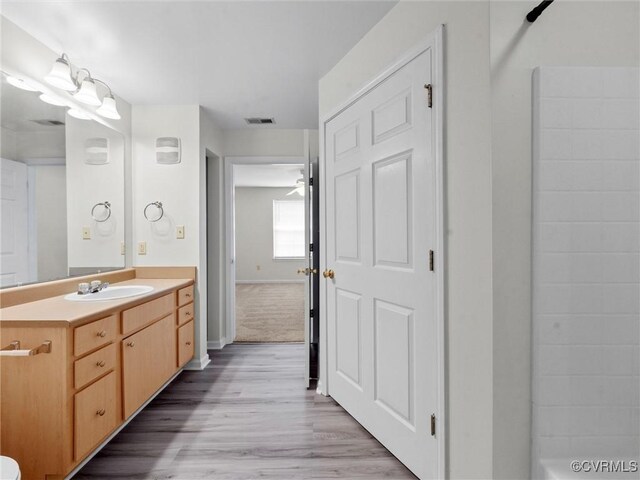 624 Bristol Village Dr Unit 302, Chesterfield, VA 23114 - full bathroom featuring vanity and wood finished floors