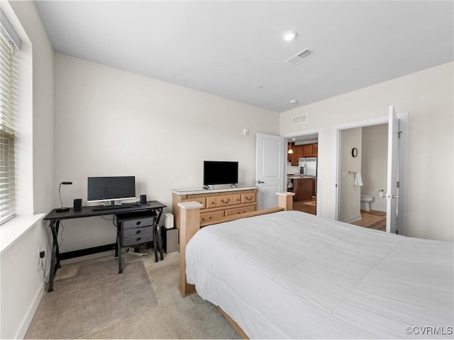 3700 Maze Runner Dr Unit 104, Midlothian, VA 23112 - bedroom with stainless steel fridge with ice dispenser, light colored carpet, and an office area