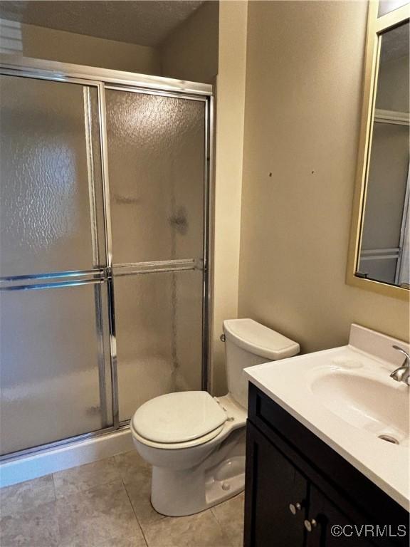 1811 Random Winds Ct, Henrico, VA 23238 - full bath featuring vanity, a stall shower, and tile patterned flooring