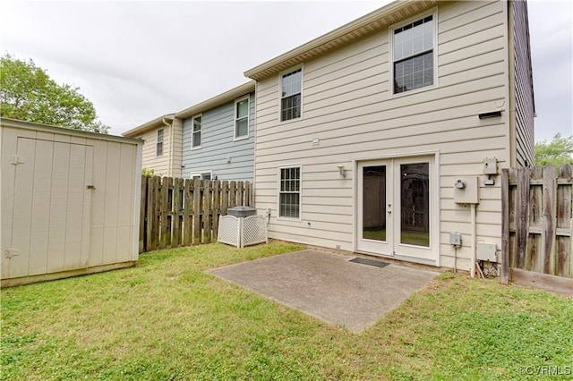 1811 Random Winds Ct, Henrico, VA 23238 - back of property with french doors, a storage shed, a fenced backyard, and a patio area