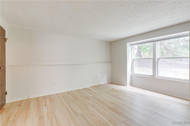 8404 Muldoon Ct Unit 4, Henrico, VA 23228 - spare room featuring wood finished floors and a textured ceiling