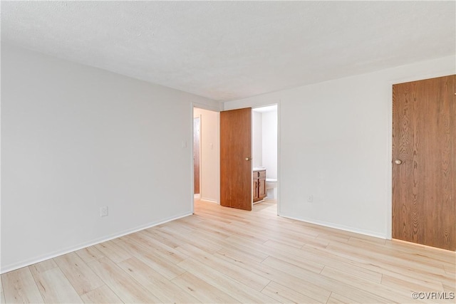 8404 Muldoon Ct Unit 4, Henrico, VA 23228 - empty room featuring light wood finished floors and baseboards