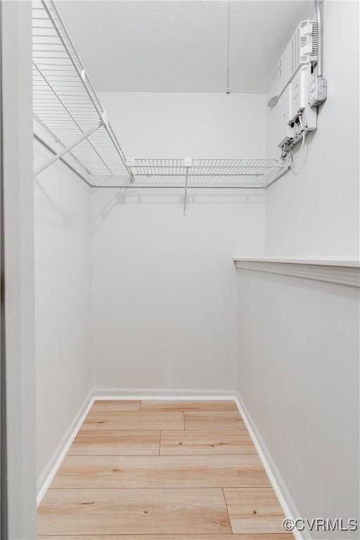 8404 Muldoon Ct Unit 4, Henrico, VA 23228 - spacious closet featuring wood finished floors