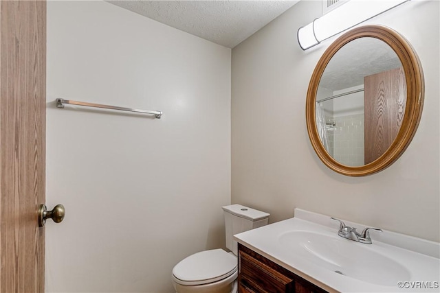 8404 Muldoon Ct Unit 4, Henrico, VA 23228 - bathroom with a textured ceiling, vanity, and a shower