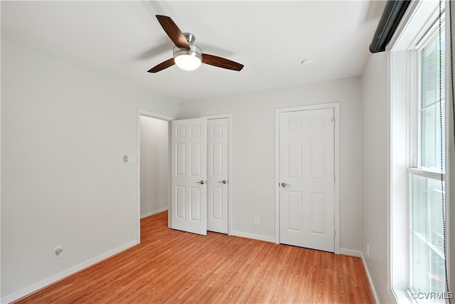 15685 Kennons Ln, Amelia, VA 23002 - unfurnished bedroom featuring light wood finished floors and ceiling fan