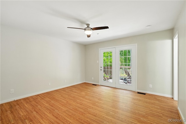 15685 Kennons Ln, Amelia, VA 23002 - empty room featuring healthy amount of natural light, a ceiling fan, and light wood finished floors