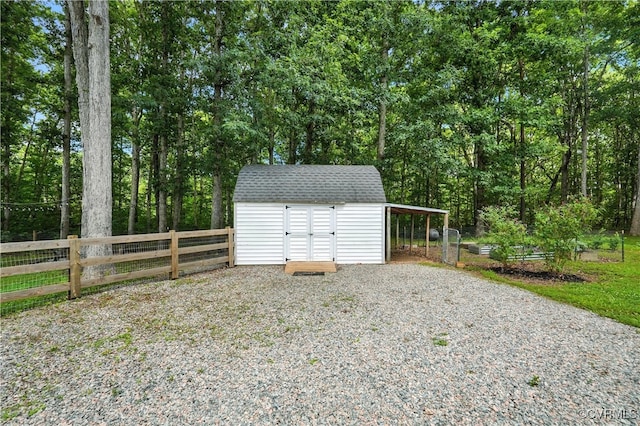 15685 Kennons Ln, Amelia, VA 23002 - view of shed featuring gravel driveway