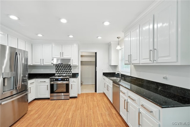 15685 Kennons Ln, Amelia, VA 23002 - kitchen featuring stainless steel appliances, under cabinet range hood, white cabinets, light wood-style flooring, and recessed lighting