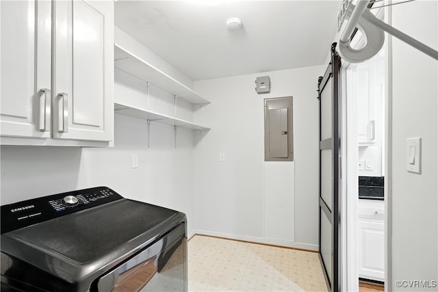 15685 Kennons Ln, Amelia, VA 23002 - washroom with washer / clothes dryer, electric panel, cabinet space, and a barn door