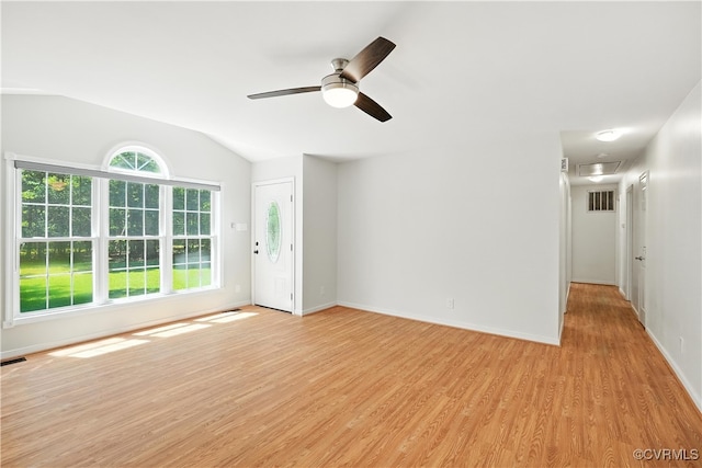15685 Kennons Ln, Amelia, VA 23002 - unfurnished living room featuring vaulted ceiling, light wood finished floors, ceiling fan, and attic access