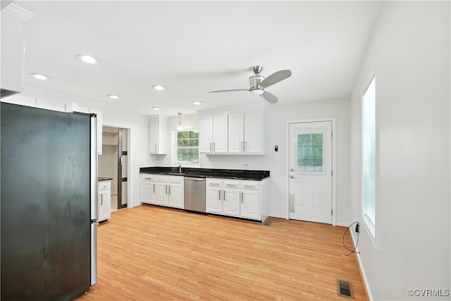 15685 Kennons Ln, Amelia, VA 23002 - kitchen featuring stainless steel appliances, white cabinetry, light wood-style flooring, ceiling fan, and recessed lighting