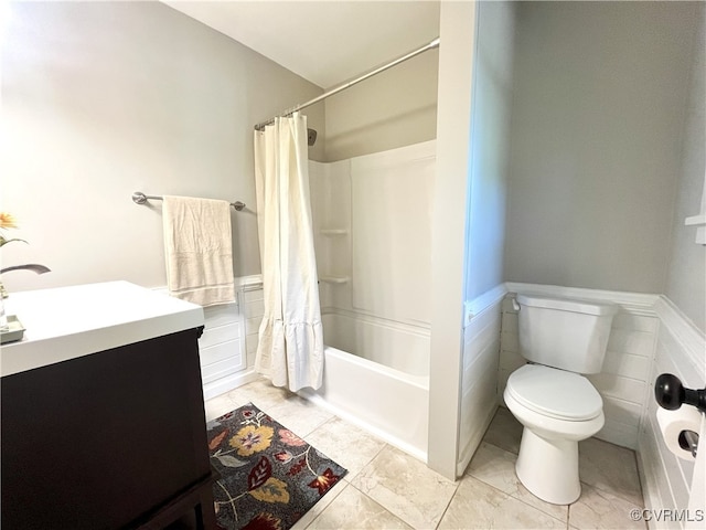 12027 Old Buckingham Rd, Midlothian, VA 23113 - full bathroom with vanity, a wainscoted wall, shower / bathtub combination with curtain, and tile patterned floors
