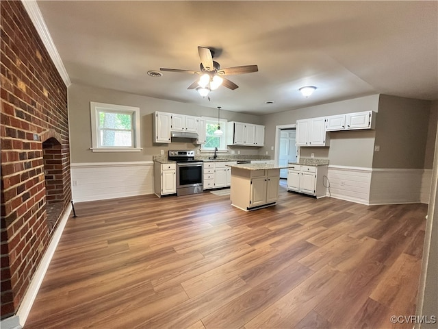 12027 Old Buckingham Rd, Midlothian, VA 23113 - kitchen with stainless steel range with electric cooktop, wainscoting, dark wood finished floors, white cabinetry, and ceiling fan