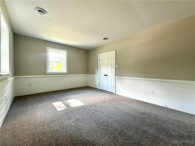 12027 Old Buckingham Rd, Midlothian, VA 23113 - carpeted empty room featuring wainscoting