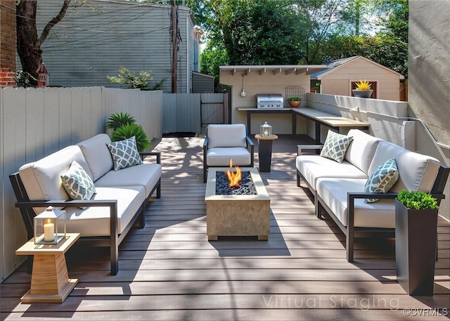 2921 E Marshall St, Richmond, VA 23223 - deck with an outdoor living space with a fire pit and area for grilling