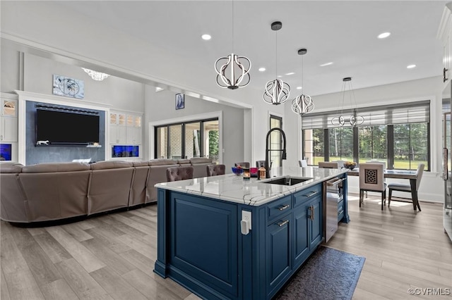 12313 Haybrook Ln, Henrico, VA 23059 - kitchen with blue cabinetry, a chandelier, light wood finished floors, and recessed lighting