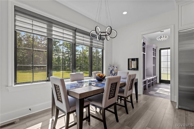 12313 Haybrook Ln, Henrico, VA 23059 - dining space featuring a chandelier, wood finished floors, and recessed lighting