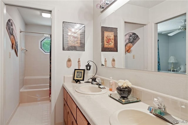 4604 Chesdin Woods Dr, Sutherland, Sutherland, VA 23885 - bathroom with double vanity,  shower combination, ceiling fan, and tile patterned flooring