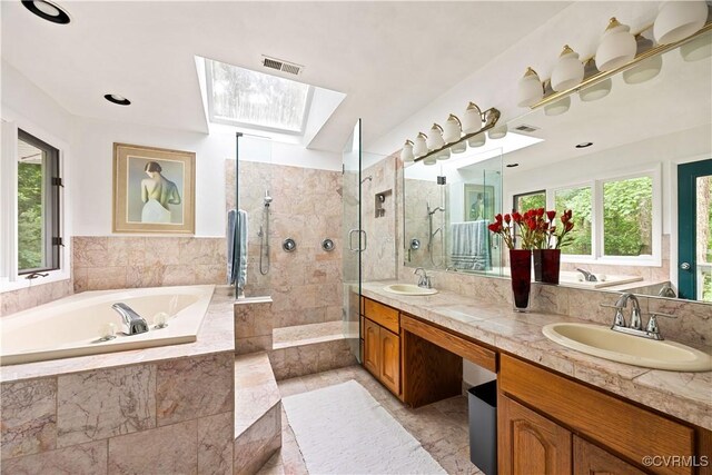 4604 Chesdin Woods Dr, Sutherland, Sutherland, VA 23885 - full bath with a garden tub, healthy amount of natural light, double vanity, and a skylight