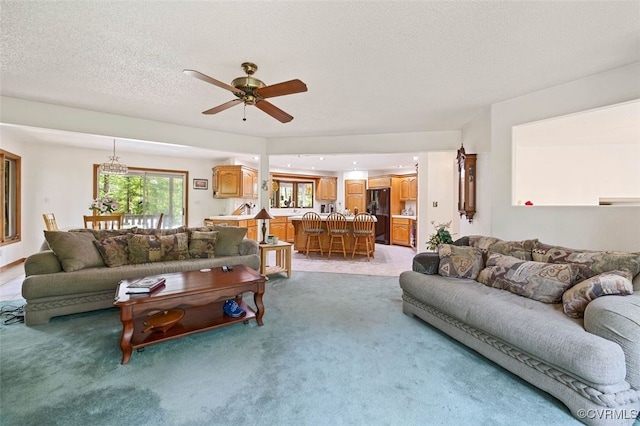 4604 Chesdin Woods Dr, Sutherland, Sutherland, VA 23885 - living room with light carpet, a ceiling fan, and a textured ceiling
