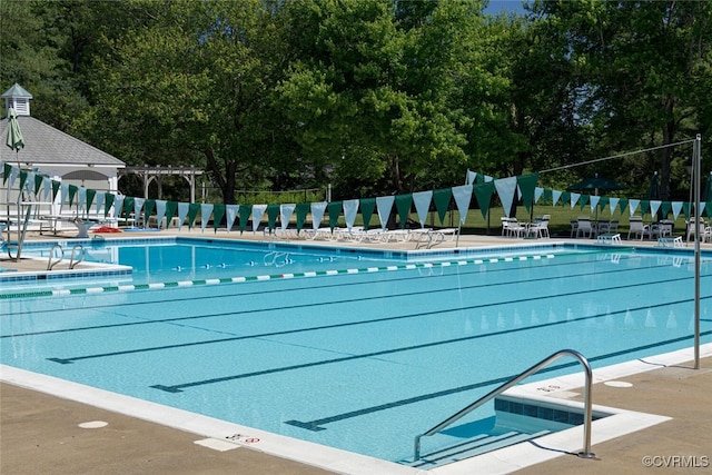 13601 Cotton Patch Ct, Henrico, VA 23233 - community pool featuring a patio area and view of wooded area