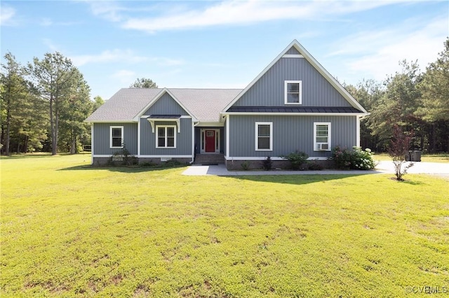8851 Topeka Rd, Quinton, VA 23141 - view of front of house featuring a front lawn, a standing seam roof, and a metal roof