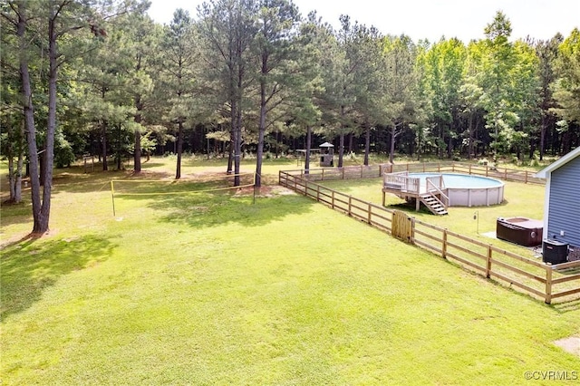 8851 Topeka Rd, Quinton, VA 23141 - view of yard with an outdoor pool and view of wooded area