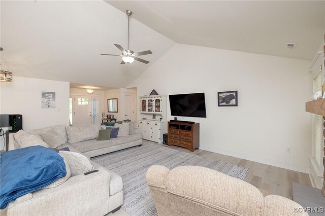 8851 Topeka Rd, Quinton, VA 23141 - living room featuring ceiling fan, light wood-type flooring, a fireplace, and high vaulted ceiling
