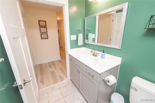 8851 Topeka Rd, Quinton, VA 23141 - half bathroom featuring vanity and wood finished floors