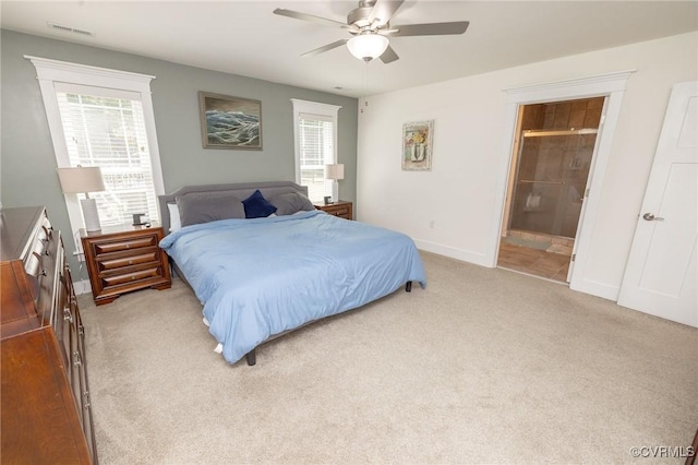 8851 Topeka Rd, Quinton, VA 23141 - bedroom featuring multiple windows, carpet, a ceiling fan, and ensuite bath