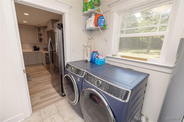 8851 Topeka Rd, Quinton, VA 23141 - laundry room featuring separate washer and dryer, recessed lighting, and light wood-style floors